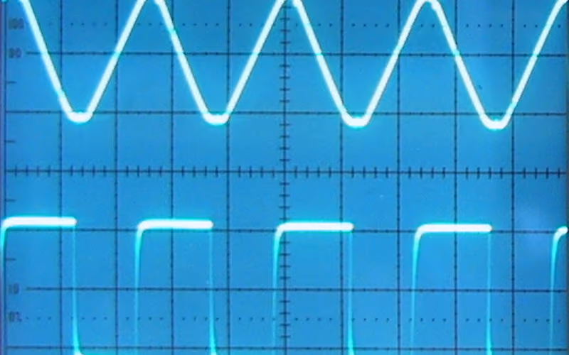 Analog oscilloscope screen showing waveform shapes for tape bias, distortion, and clarity
