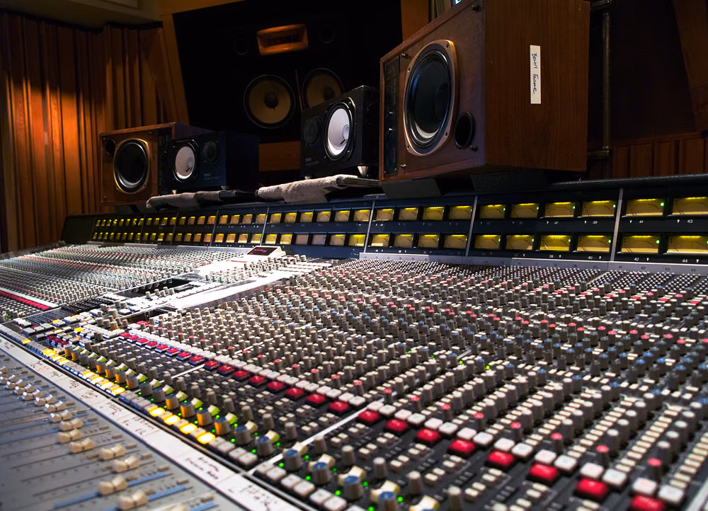 SSL mixing console in a professional mix room — bus compression and mix glue