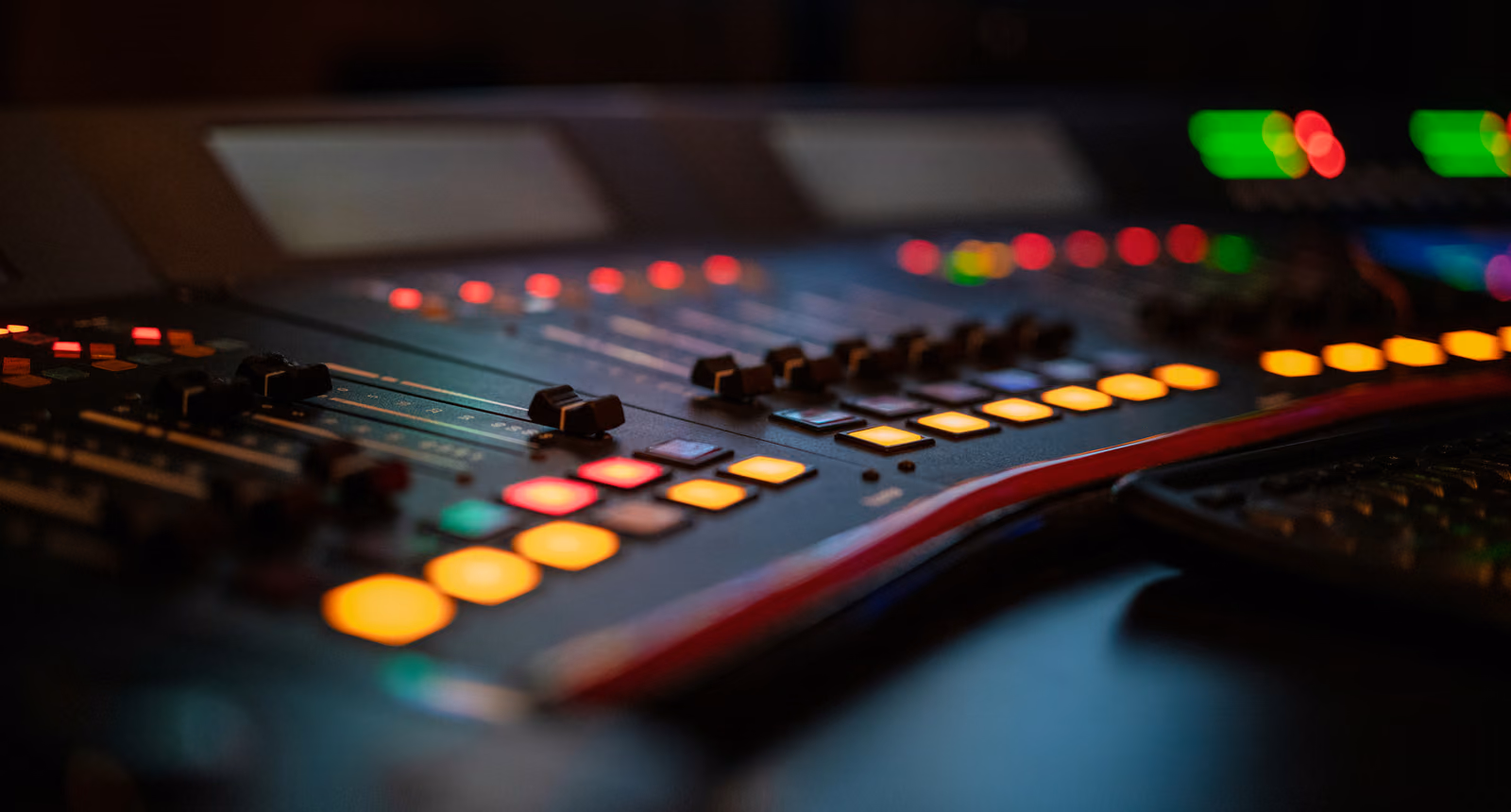 Illuminated audio console controls representing digital tape plugin processing quality