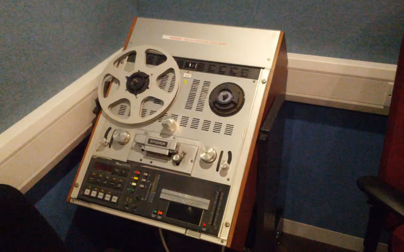 Professional Studer A810 reel-to-reel master tape recorder in a studio