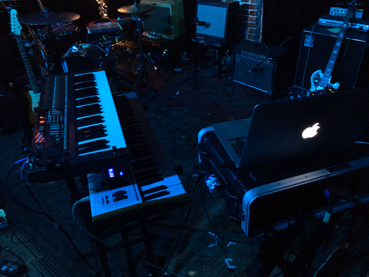Laptop and MIDI keyboards in a home studio. Photo Mitchschneider88, CC BY-SA 4.0