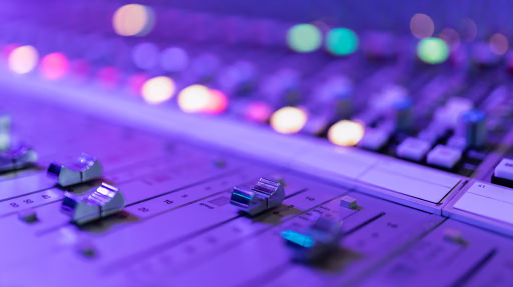 Professional mixing console in a recording studio — process your mix with Tape DSP analog tape tone